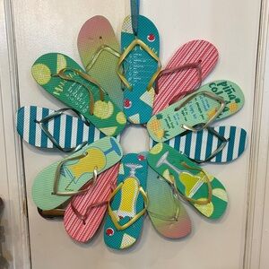 Colorful, made by hand, flip-flop wreath. Perfect for summer decor!!